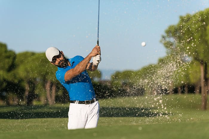Which golf club is designed to hit the ball with the highest launch angle?